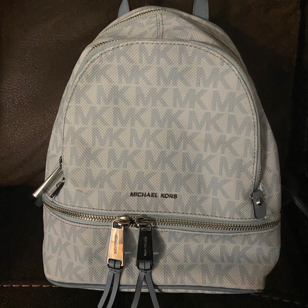 Michael Kors mini baby blue backpack. Two zippers